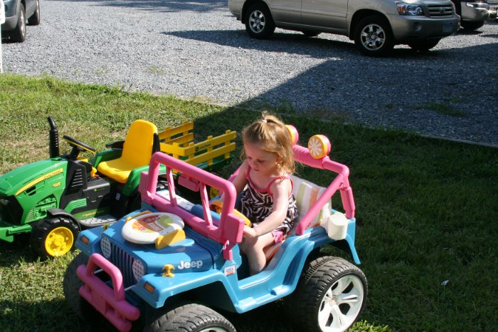 Amber studies her Barbie Jeep